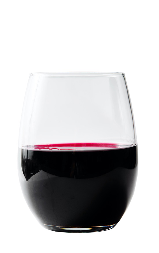 A glass of Strange Fellows Brewing the Strangers Red Wine in a stemless wine glass